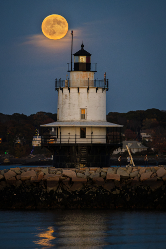 Oct. 17, 2024 Super Moon over Spring Point Light in Casco Bay. (photo by Troy R. Bennett)