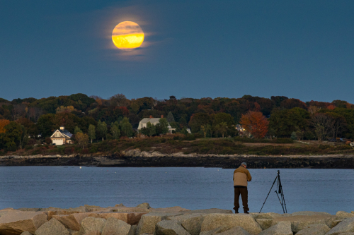 Oct. 17, 2024 Super Moon over Spring Point Light in Casco Bay. (photo by Troy R. Bennett)